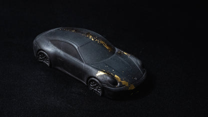 Schwarzer Porsche 911 mit Blattgold